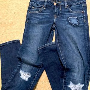 Bebe Camilla low rise skinny jeans (size 25)